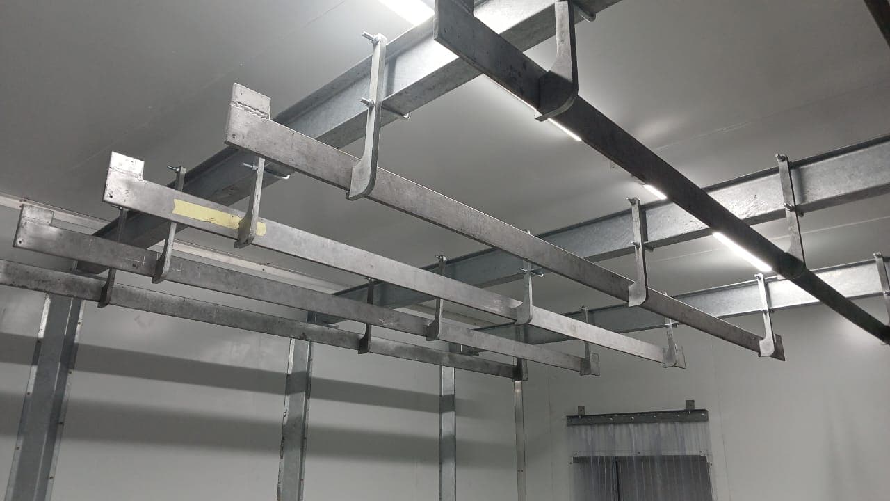 Interior of an insulated cold room with hanging rails